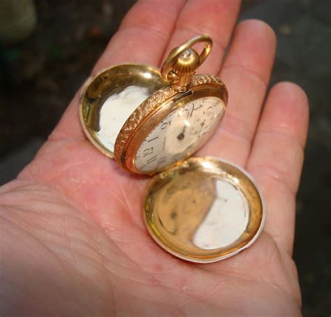 solid gold pocket watch value.